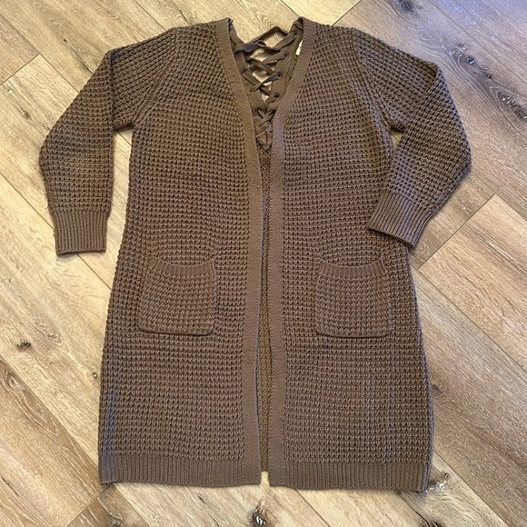 Boutique sweater. Pockets on front & cute laces, & bow on back. Dark Taupe. M/L - Picture 1 of 4
